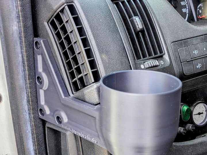 3D printed cup holder in the dashboard of a Fiat Ducato