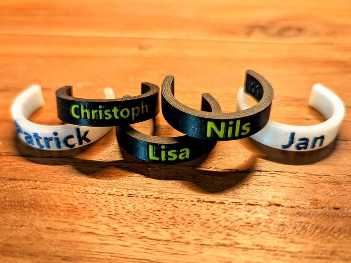 Multicolour printed bottle markers with first names